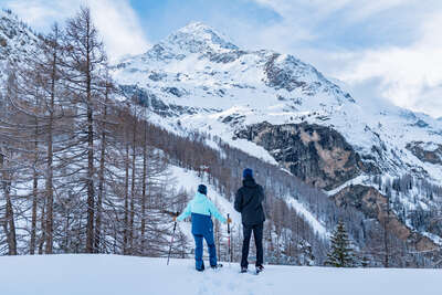 Pedestrians on snowshoes in Tignes